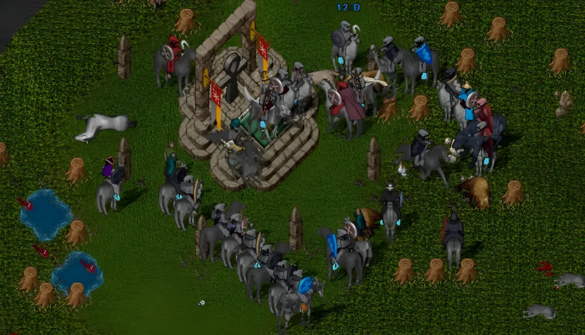 A crowd of armoured players on horseback gathered on a grassy clearing around a stone ankh shrine