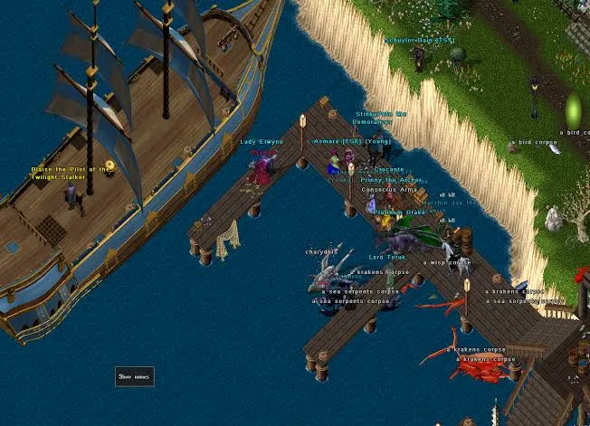 A wooden pier beside a tall sailing ship on blue water, with player characters standing on the dock and sea creature corpses floating nearby