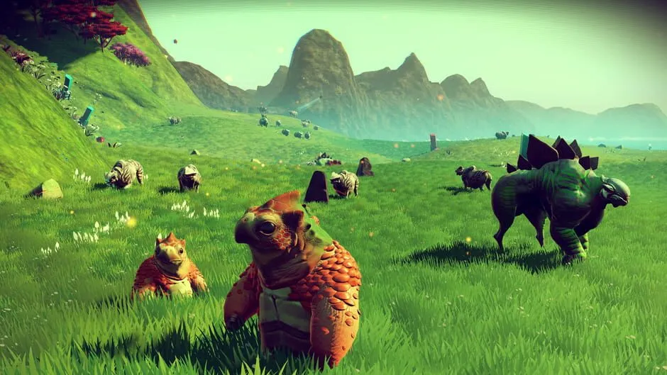 Several alien creatures grazing on a bright green meadow with mountains in the distance
